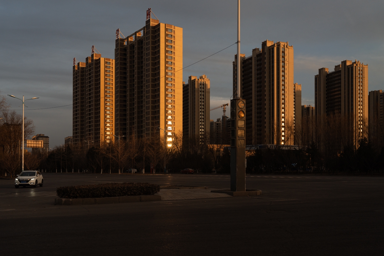 New residential towers at the edge of a city